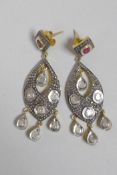 A pair of silver gilt pendant earrings set with Indian uncut diamonds, 2½" drop
