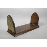 A Gothic oak book slide with decorative brass mounts to end, 13" long collapsed