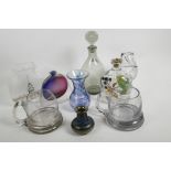 A collection of studio glass including a Holmegaard dimple decanter, a Pasabahce vase with silver