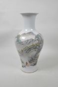 A Chinese famille verte porcelain vase decorated with a sole figure in a mountain landscape, 6