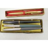 Three Parker fountain pens and a Scripto golden ball point pen