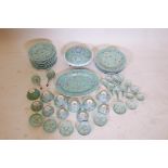 A Chinese famille vert porcelain dinner service including an oval serving plate, soup tureen, 10"