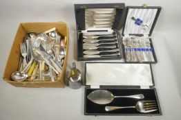 A quantity of silver plated flatware to include boxed fish servers, fish knives and teaspoons