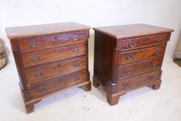 A near pair of mahogany side chests of four long drawers flanked by half columns, raised on