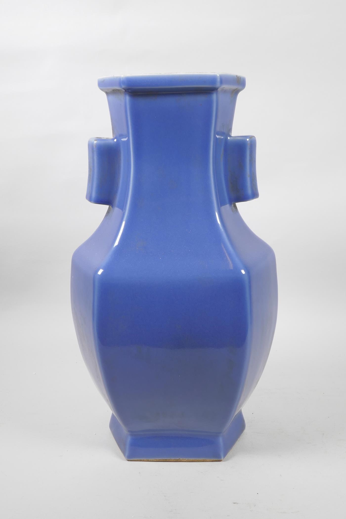 A Chinese blue glazed porcelain vase with two lug handles, 6 character mark to base, 14½" high