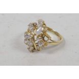 A 14ct gold and cubic zirconium dress ring, size 'R'