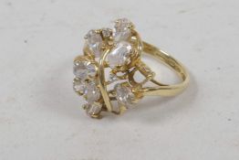 A 14ct gold and cubic zirconium dress ring, size 'R'