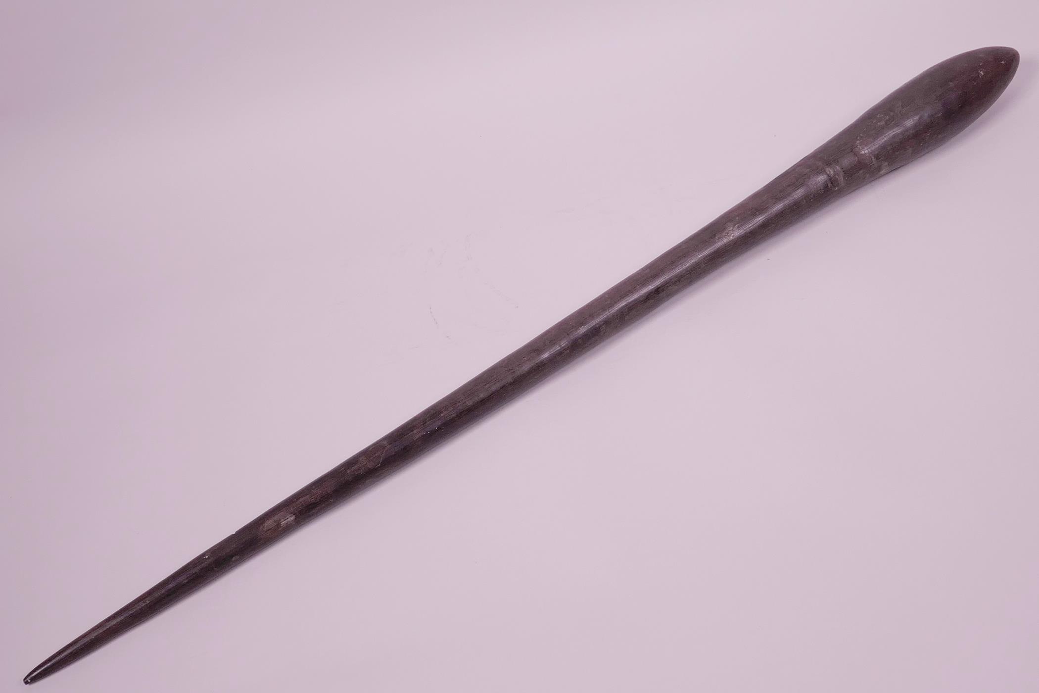 A C19th Pacific Islands tapered hardwood throwing club, 26" long