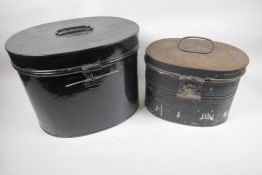A black painted oval metal hat box, 10½" high, 14" wide, together with another smaller