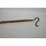 A vintage shepherd's crook with blacksmith wrought iron crook, 63" long