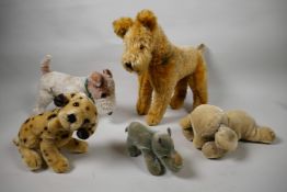 A collection of five mid C20th Steiff style stuffed toys, with plush mohair coats, including '
