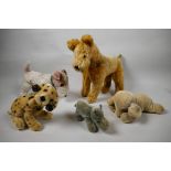 A collection of five mid C20th Steiff style stuffed toys, with plush mohair coats, including '