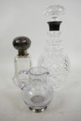A ring neck cut glass decanter with hallmarked silver collar, 11½" high, together with a square
