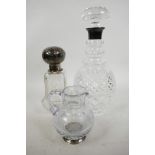 A ring neck cut glass decanter with hallmarked silver collar, 11½" high, together with a square