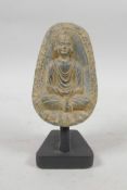 A Gandhara style carved stone Buddha tablet, 5" high
