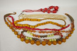 A quantity of bead necklaces including faux amber