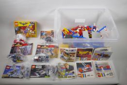 A large collection of original 'Lego System' pieces and manuals (all loose), together with a