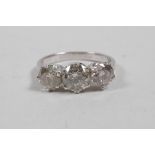 An 18ct white gold three stone diamond ring, approximately 1.91ct, approximate size 'M/N'