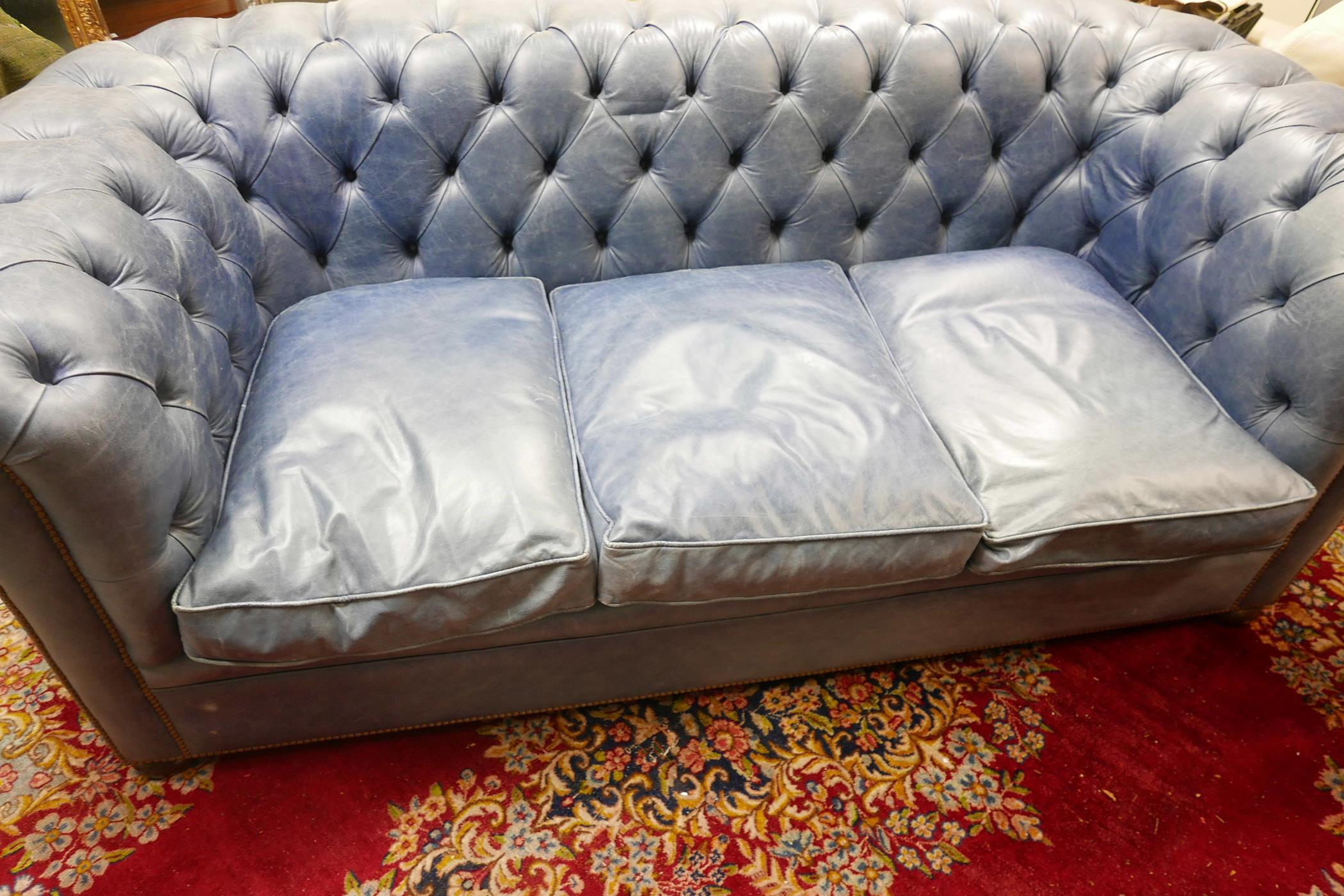 A blue leather high back Chesterfield three seater sofa, 88" x 42", 33" high - Image 2 of 3