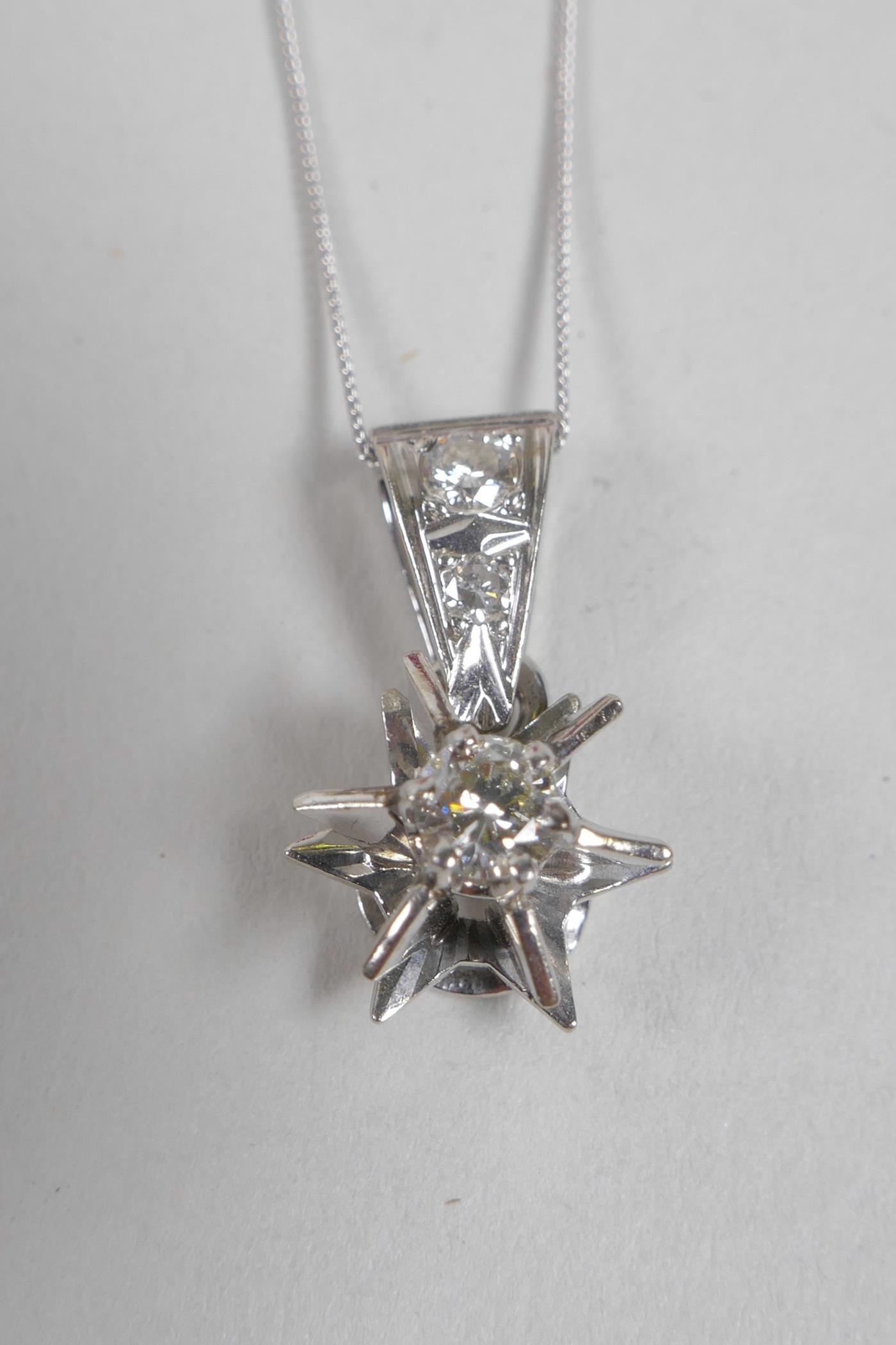 An 18ct white gold, star shaped and diamond set pendant necklace - Image 2 of 3