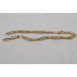 A 14ct gold and cubic zirconium bracelet, A/F, gross 9.9 grams