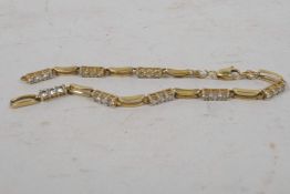 A 14ct gold and cubic zirconium bracelet, A/F, gross 9.9 grams