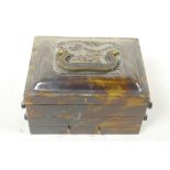 A Chinese faux tortoiseshell trinket box, with cantilever action and three compartments, pierced