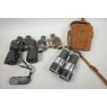 A pair of N.S.L. lightweight aluminium binoculars, model Y2725, together with two other pairs of