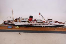 A diorama of a Manx ferry at dock, 46" x 18", another of a cargo vessel and the Royal Yacht