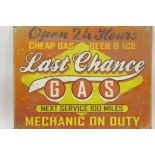 A replica road sign, 'Last Chance Service Station', 16" x 12½"