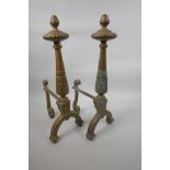A pair of classical style brass fire dogs with engraved decoration, 18" high x 8½" deep