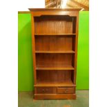 A hardwood open bookcase with fixed shelves and two drawers, 39" x 17" x 74"