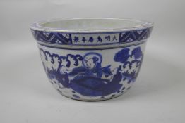 A Chinese blue and white porcelain jardiniere decorated with figures in a landscape, star cracks