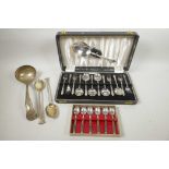 A set of 'Angora' silver plated dessert forks and spoons with serving spoon, a thirteen piece set in