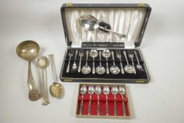 A set of 'Angora' silver plated dessert forks and spoons with serving spoon, a thirteen piece set in