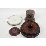 A Chinese carved wood vase stand, 6" diameter, together with a marble socle, 3½" diameter, a