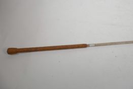 A carriage whip by the Wonder Whip Company Canada with bound leather handle, 66" long