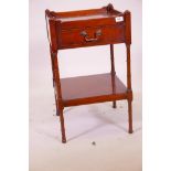A mahogany single drawer lamp table, with galleried top, raised on ring turned supports, 16" s 16" x
