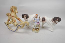 A pottery rocking horse, 10½" long, two ceramic models of dogs and a Continental porcelain match