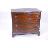 A mahogany serpentine fronted four drawer chest, with brush slide, raised on ogee bracket feet,