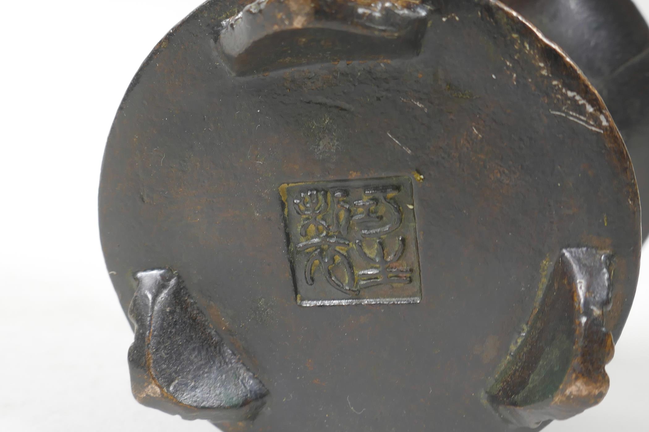 A Chinese bronze burner and cover of waisted form, impressed 4 character seal mark to base, 3½" high - Image 3 of 3