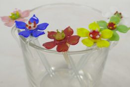 A set of six glass swizzle sticks, each with different coloured glass finials, 4" long