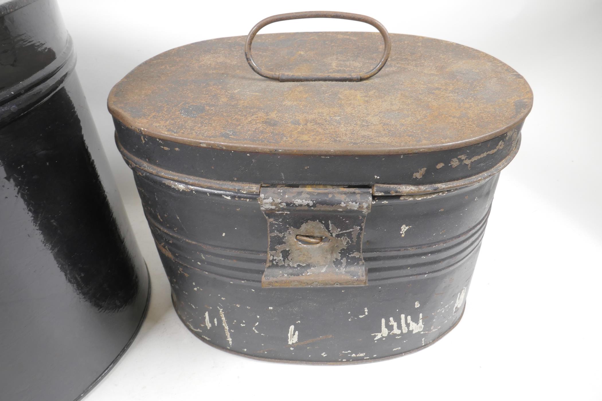 A black painted oval metal hat box, 10½" high, 14" wide, together with another smaller - Image 2 of 3