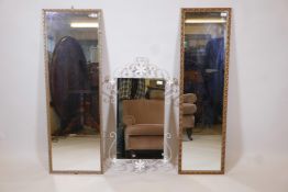 A mid century painted wrought metal wall mirror with floral details, and two long gilt framed