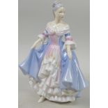 A boxed Royal Doulton figurine, 'Southern Belle', 7" high