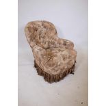 A Victorian button back tub chair