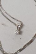 A solitaire diamond pendant set in 18ct gold on 18ct gold chain, 3.9 grams gross