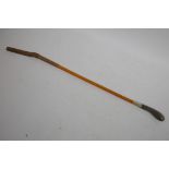 A small Swaine riding crop with carved horn handle and Malacca cane, 17" long excluding leather