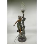 An Art Nouveau spelter lamp in the form of a lady standing by a column, after Moreau, titled '