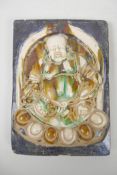 A Chinese Sancai glazed pottery tile/panel with raised Buddha decoration, 7" x 10"